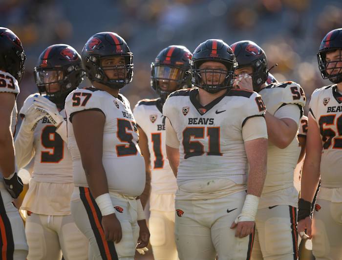 Nov 19, 2022; Tempe, Arizona, USA; Oregon State Beavers offensive lineman Dylan Lopez (57) and Tanner Miller (61) against the Arizona State Sun Devils at Sun Devil Stadium. Mandatory Credit: Mark J. Rebilas-USA TODAY Sports